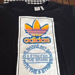 Adidas Black Tee with Vibrant Logo